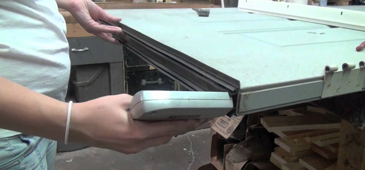 damaged steel door repair Carrollwood