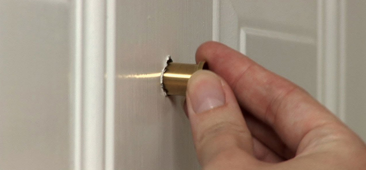 peephole door repair in Carrollwood